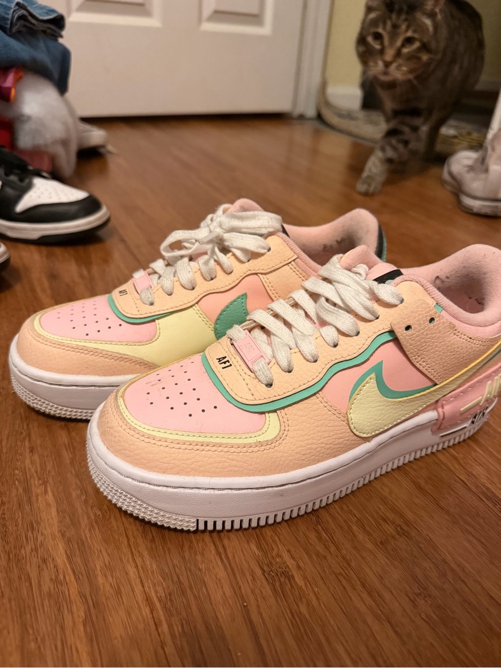 Nike women’s Pastel Peach Pink Mint Low-Top Sneakers